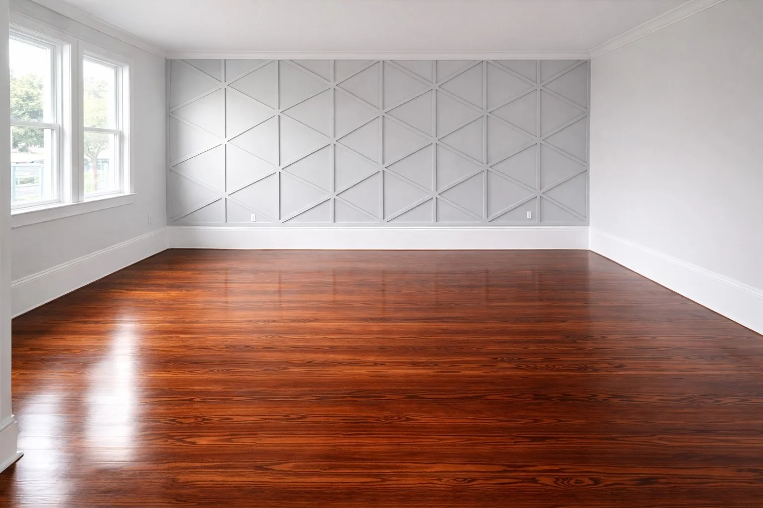 Heart of pine hardwood flooring with rich natural grain, professionally refinished and installed in a bright interior space in new orleans, LA  by Grand Rising Construction