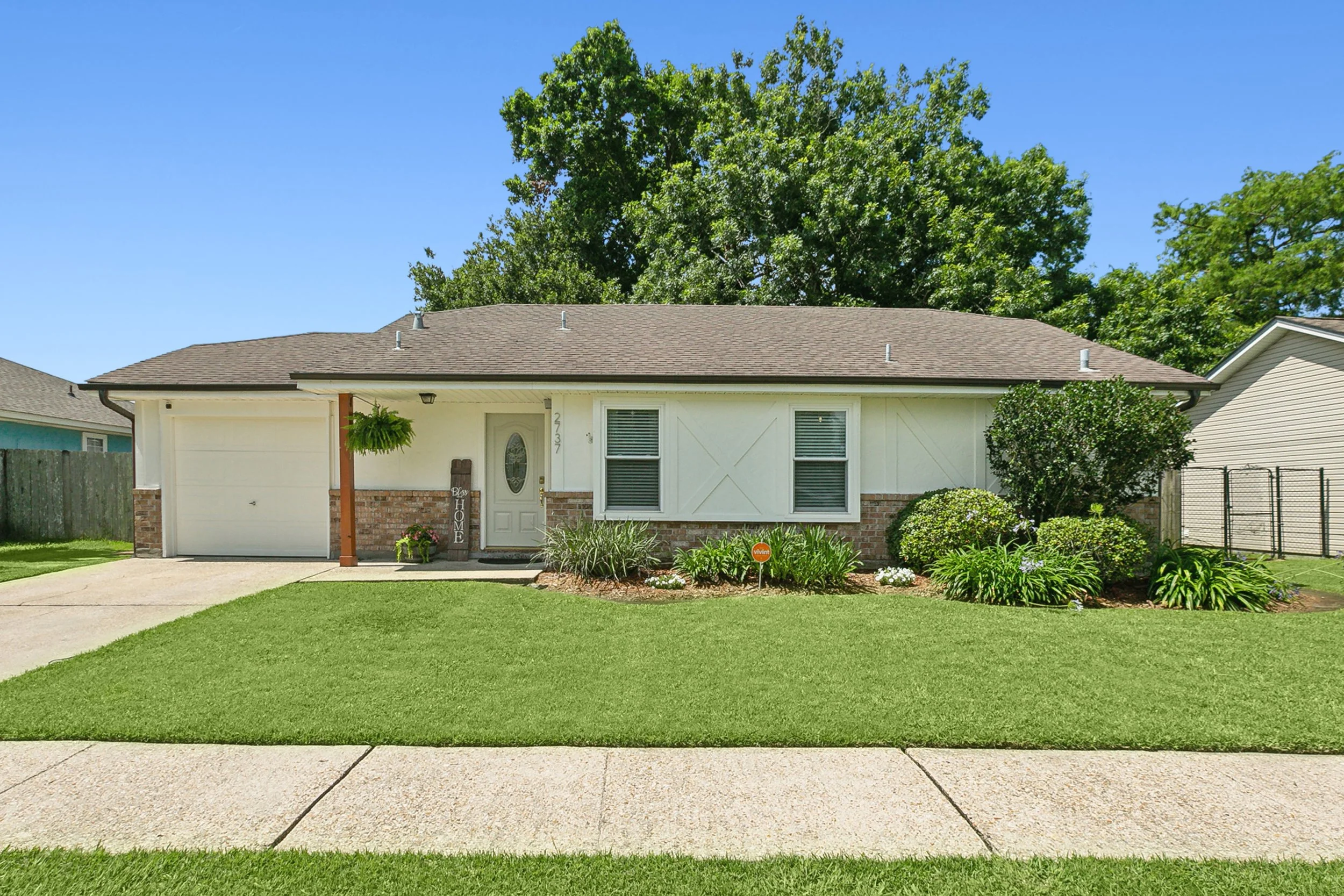 Completed full home renovation featuring updated exterior finishes, new landscaping, and improved curb appeal.
