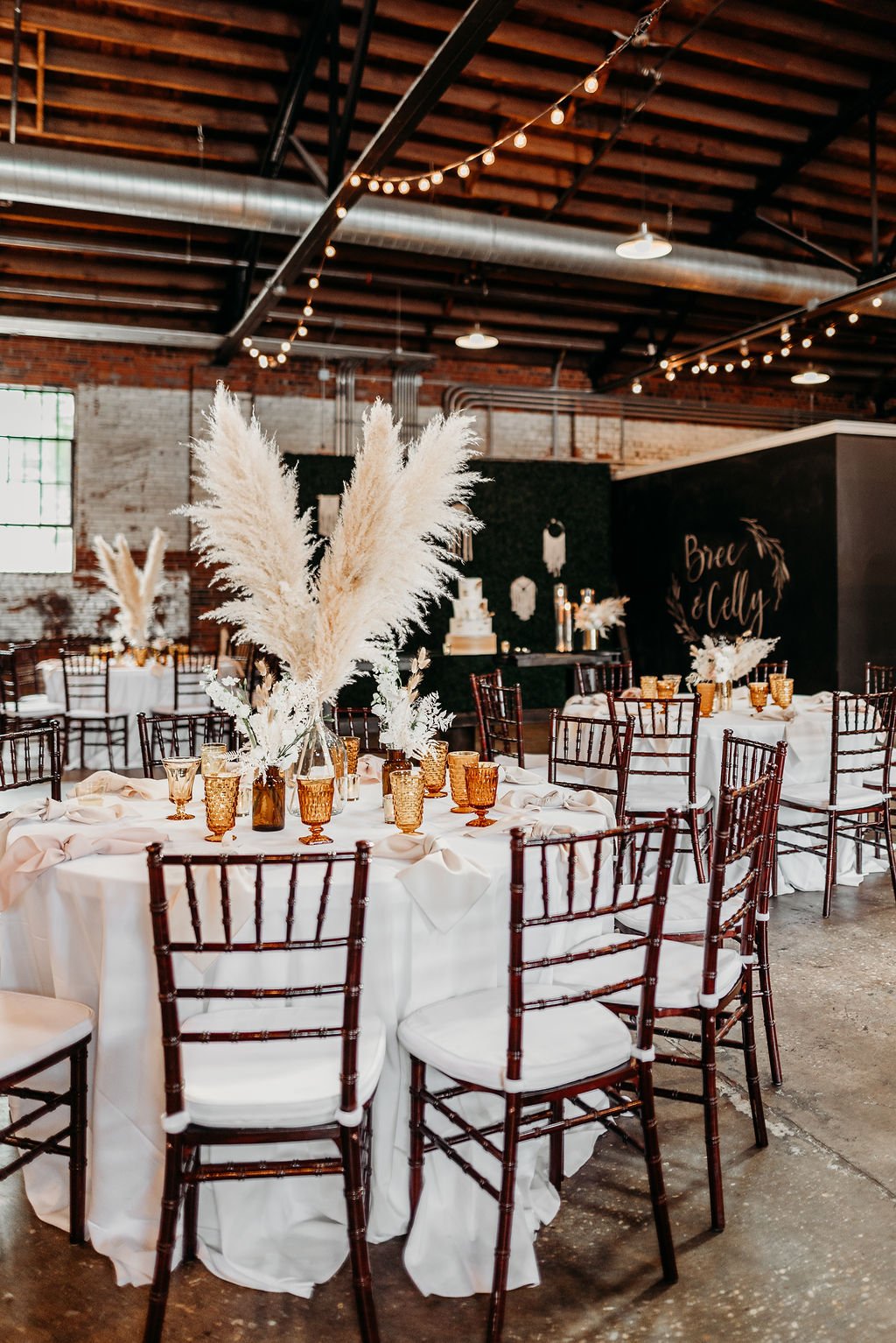 Studio 215 industrial-chic wedding and event venue in Fayetteville, NC, featuring exposed brick, high ceilings, and modern warehouse architecture for ceremonies and receptions.