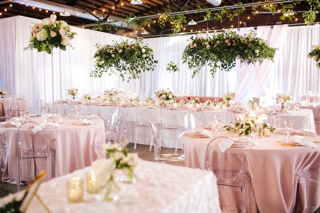 Studio 215 industrial-chic wedding and event venue in Fayetteville, NC, featuring exposed brick, high ceilings, and modern warehouse architecture for ceremonies and receptions.