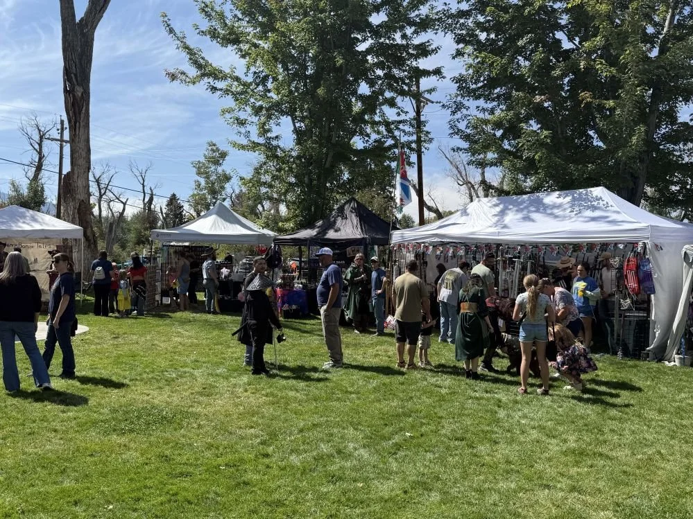 Vendor booths and families at Robin Hood Renaissance Faire (10).jpg