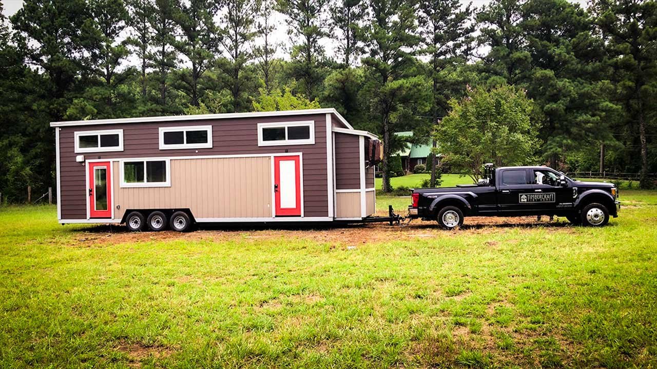 Aug-9-2019-Tiny-House-Pulled-on-Land.jpg