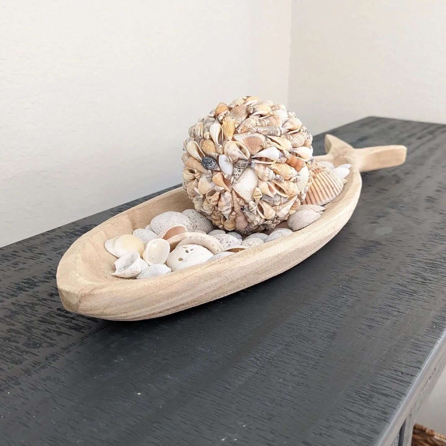 What do you do with the many, many seashells your kids collect?  Make decor out of it, of course.

I wish I could take credit for that seashell ball, and if I wasn't in a time crunch when we needed to finish up this project, I could've made one, but 