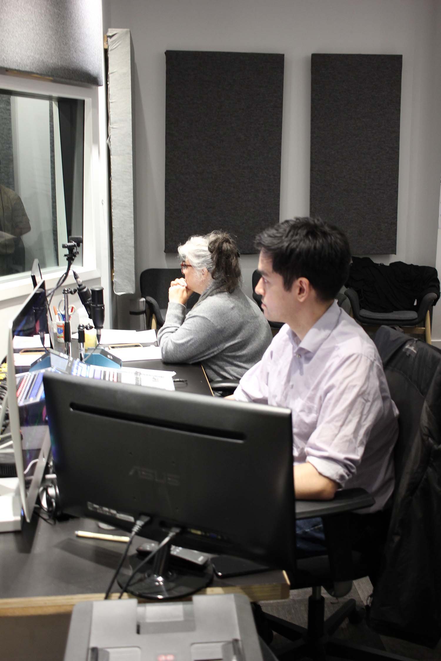 Voice-over students working at computers and recording equipment during a Voice-Over Skills Bootcamp class