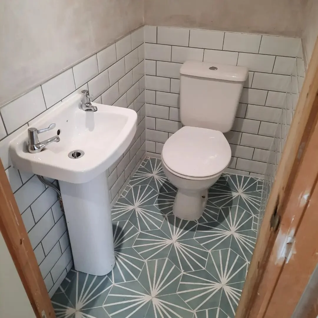 We transformed this dated utility room and added a new shower on this project in Templeogue - check out the before and afters