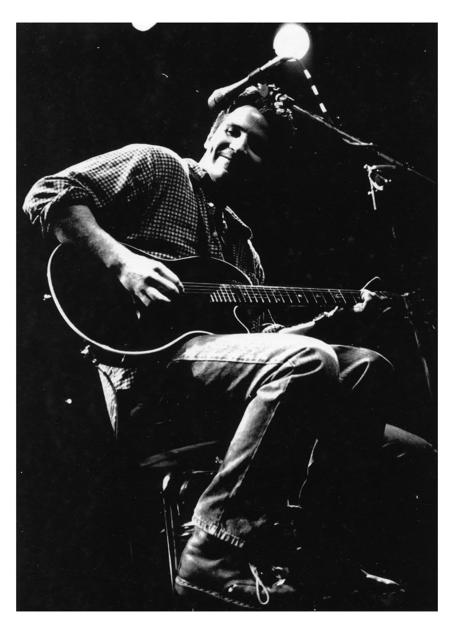 Martin Zellar black and white on stage playing guitar retro