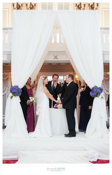 25.-Blackstone-Hotel-Wedding.-Deonna-Caruso-Photography.-Sweetchic-Events.-Flor-Del-Monte.-Ivory-Fabric-Chuppah-with-Purple-Hydrangea-En-Masse..jpg