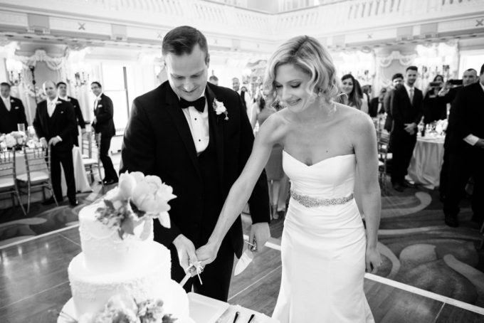 38.-Blackstone-Chicago-Wedding.-Pen-Carlson.-Sweetchic-Events.-cake-cutting.-bride-and-groom.-black-and-white.-680x454.jpg