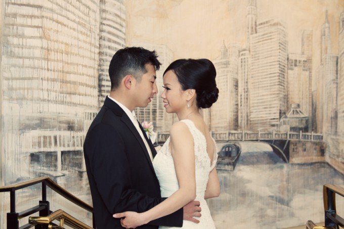 15.-Rookery-Wedding.-Kevin-Le-Photography.-Sweetchic-Events.-Bride-and-Groom-in-front-of-artwork.-680x453.jpg