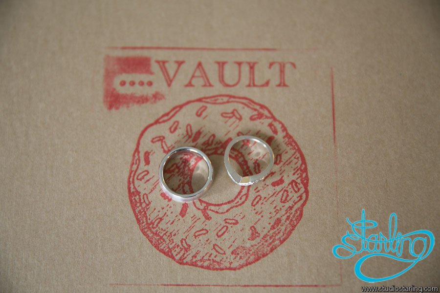 6.-U-of-C-Hutchinson-Commons-Wedding.-Studio-Starling.-Sweetchic-Events.-Ring-Shot-on-Vault-Doughnut-Box..jpg