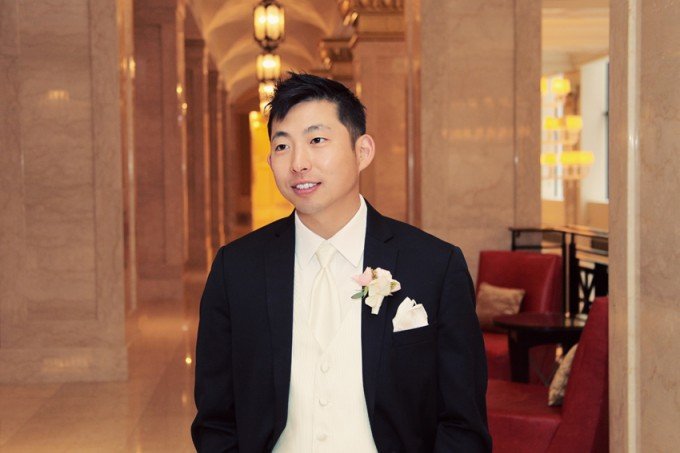 12.-Rookery-Wedding.-Kevin-Le-Photography.-Sweetchic-Events.-Vale-of-Enna.-Groom-waiting-for-First-Look.-Pale-pink-ranunuculus-and-stephanotis-with-pearls-boutonniere.-680x453.jpg