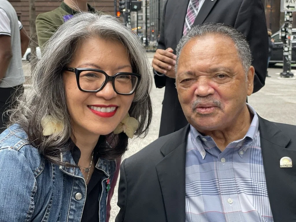 reverand jesse jackson and Leni posing for a selfie