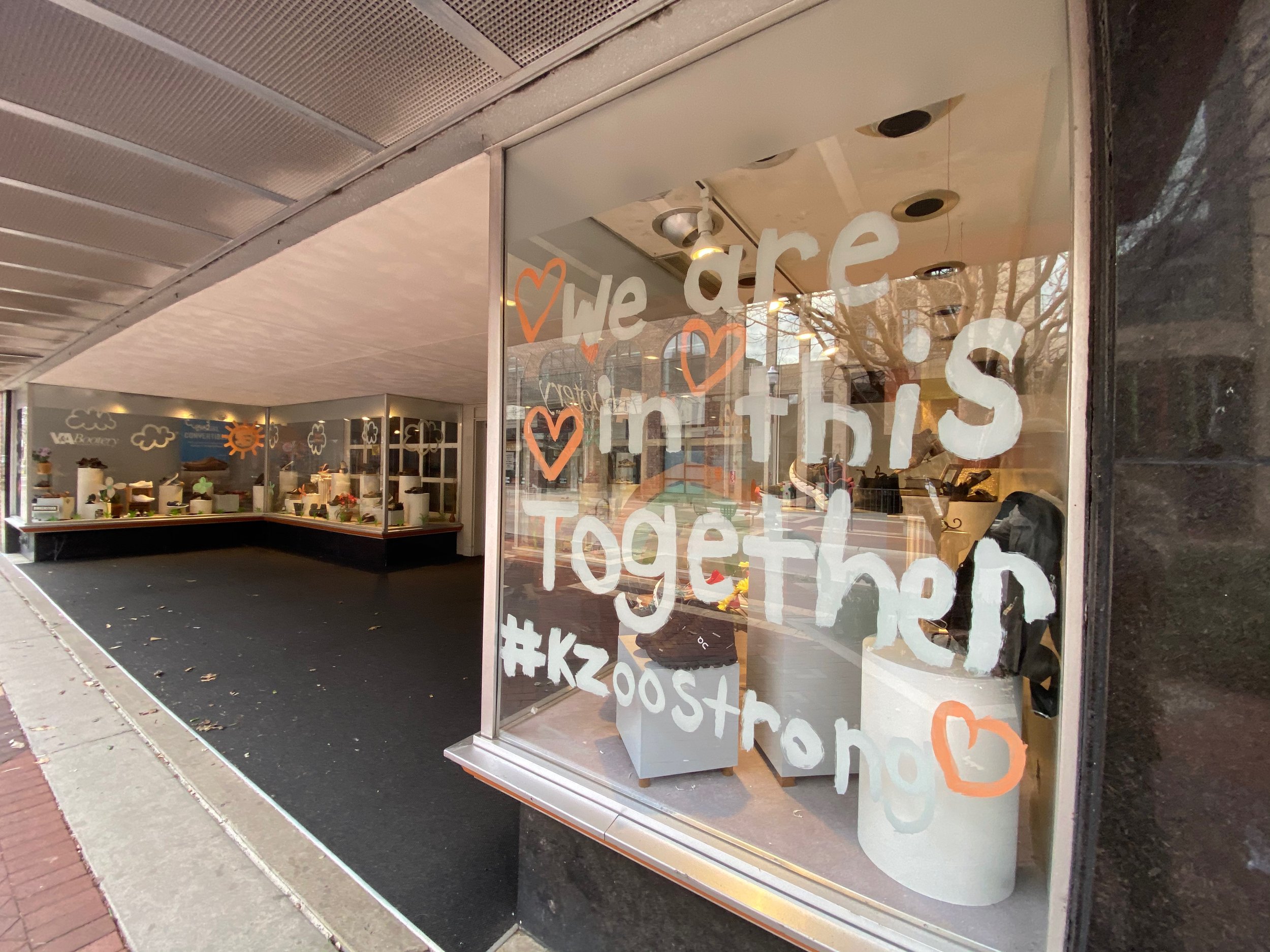 "We are in this together" -- one of the many signs of encourage downtown Kalamazoo. April 10, 2020 outside of V&A Bootery on the Kalamazoo Mall.