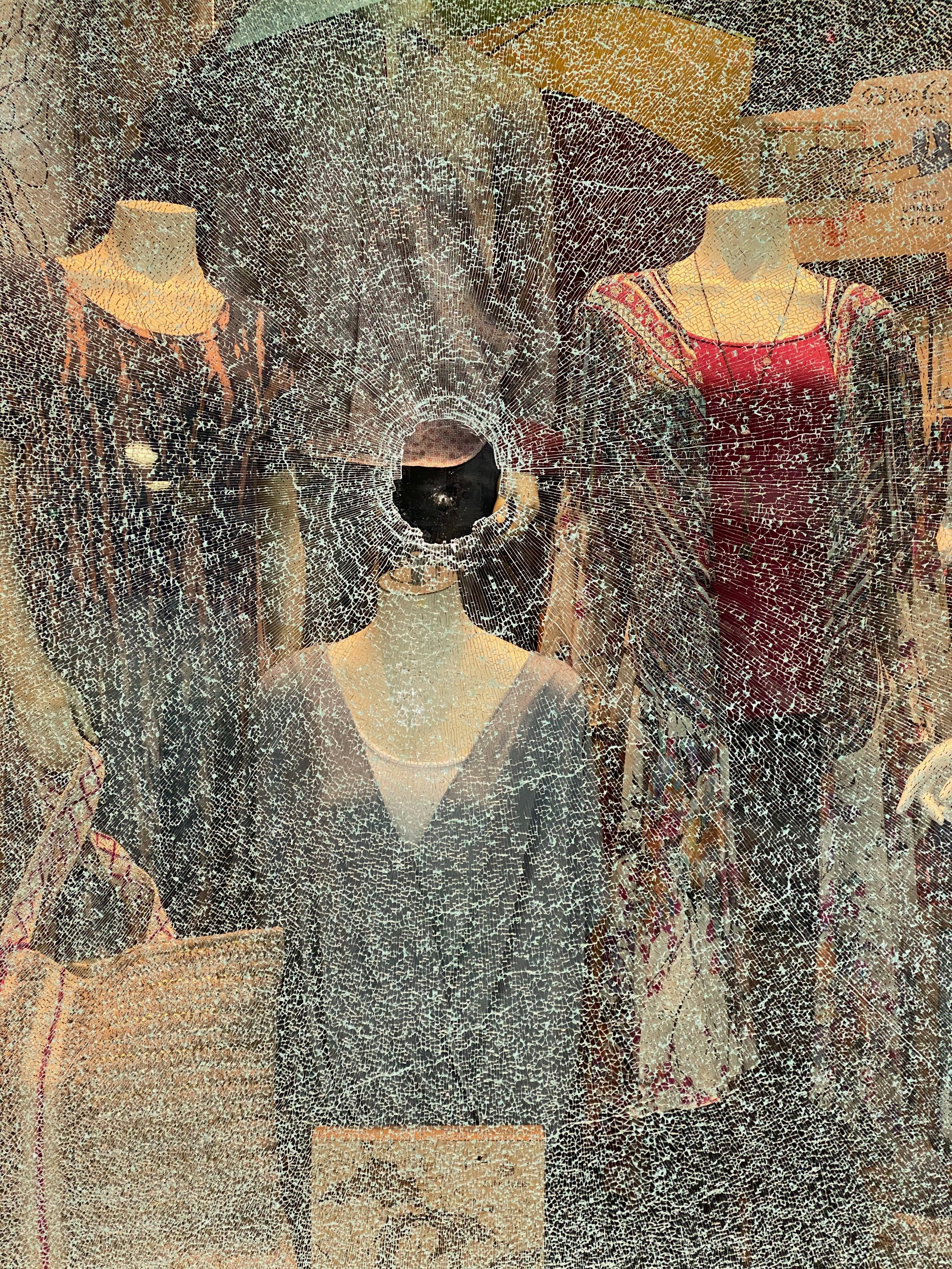 A broken window at Lana's Boutique on June 2, 2020, after multiple groups of people smashed windows downtown.
