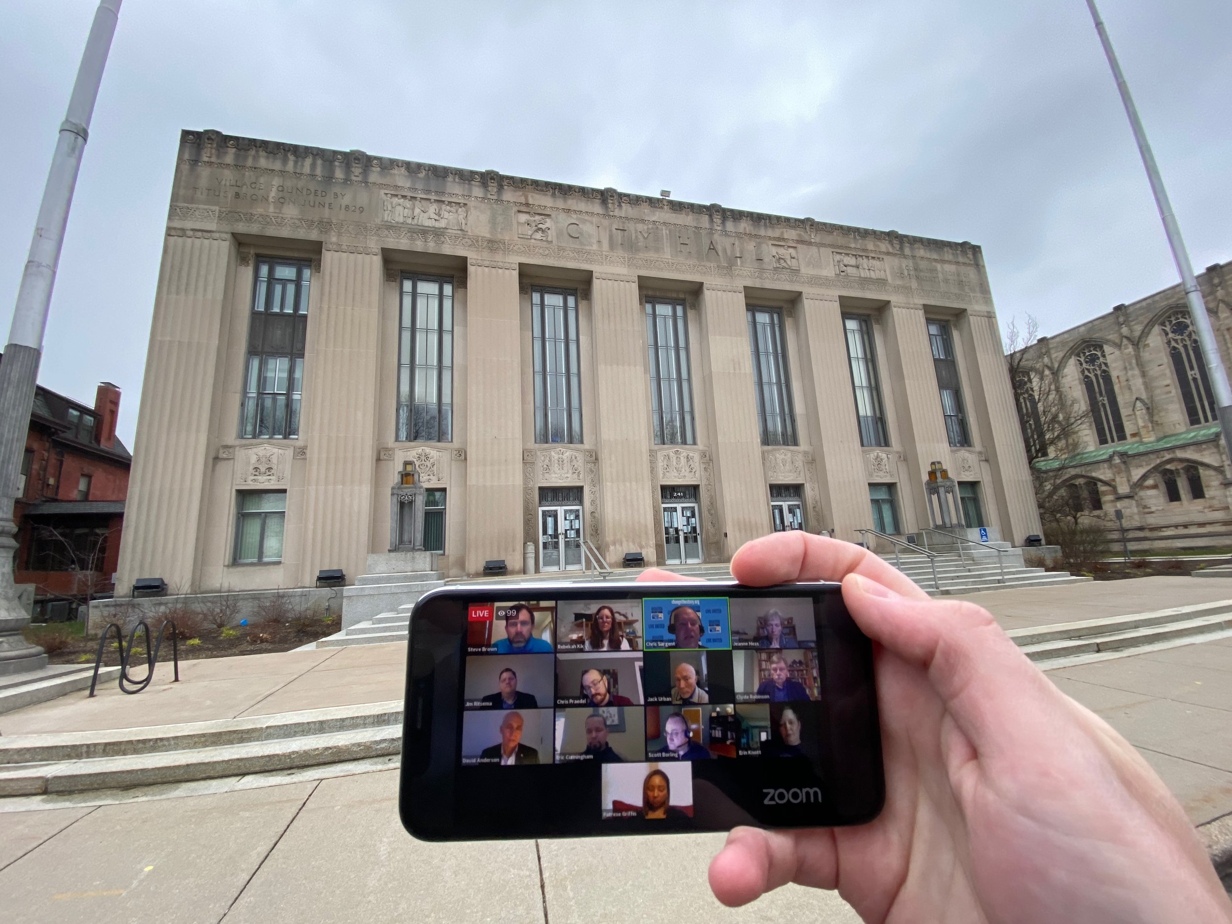 The first virtual meeting of the Kalamazoo City Commission on March 31, 2020, seen on Zoom outside of an empty City Hall.