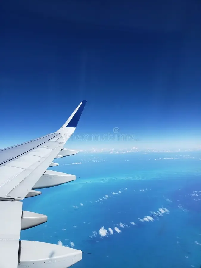plane-flying-over-sea-beautiful-scenery-blue-aesthetic-plane-flying-over-sea-beautiful-scenery-blue-aesthetic-287710487.webp