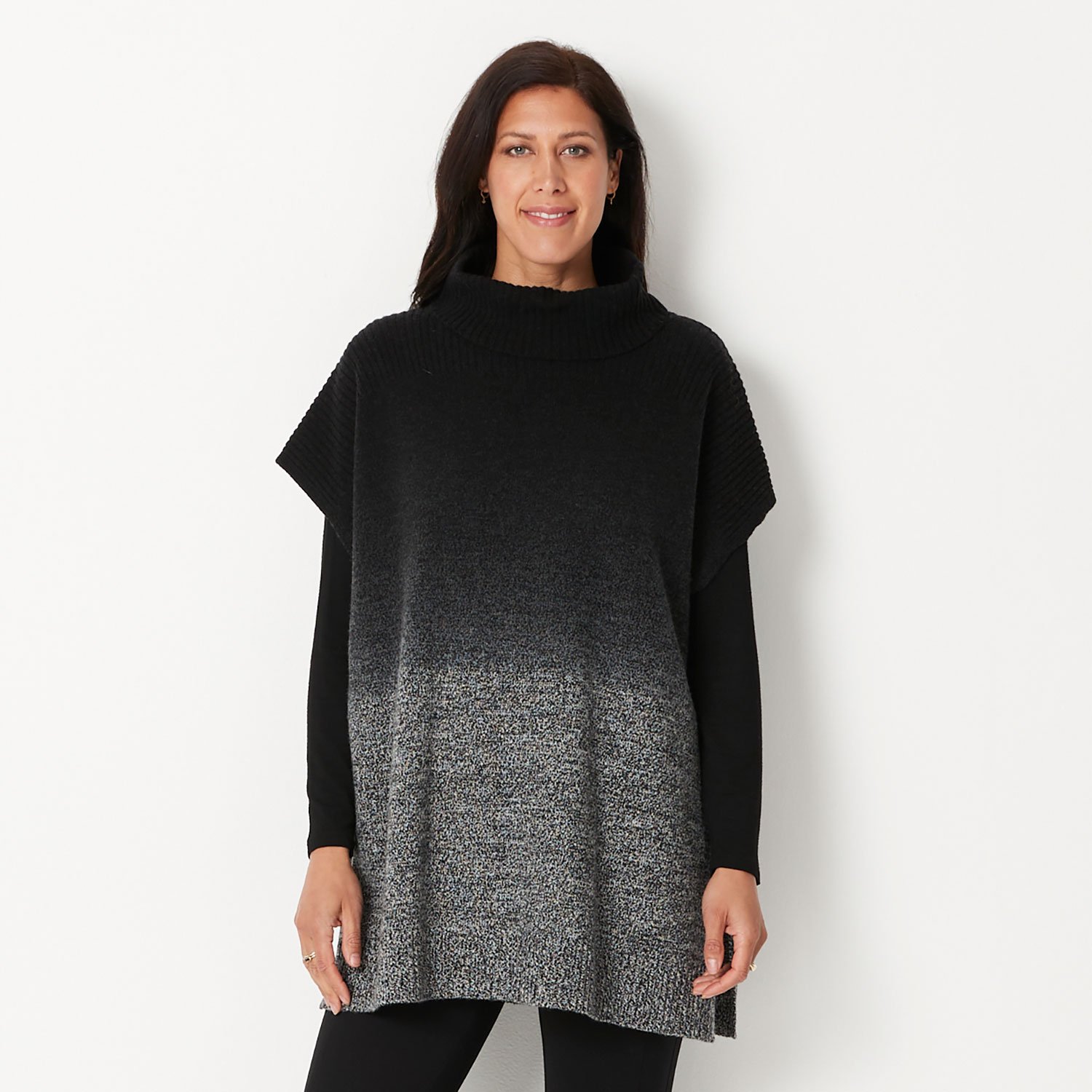This ombre poncho is amazing!  It has side splits and a short sleeve and is so good for layering.  Looks great with a slim leg pant too.  Available in store and online now.

#winter #stylish #contemporary #quality