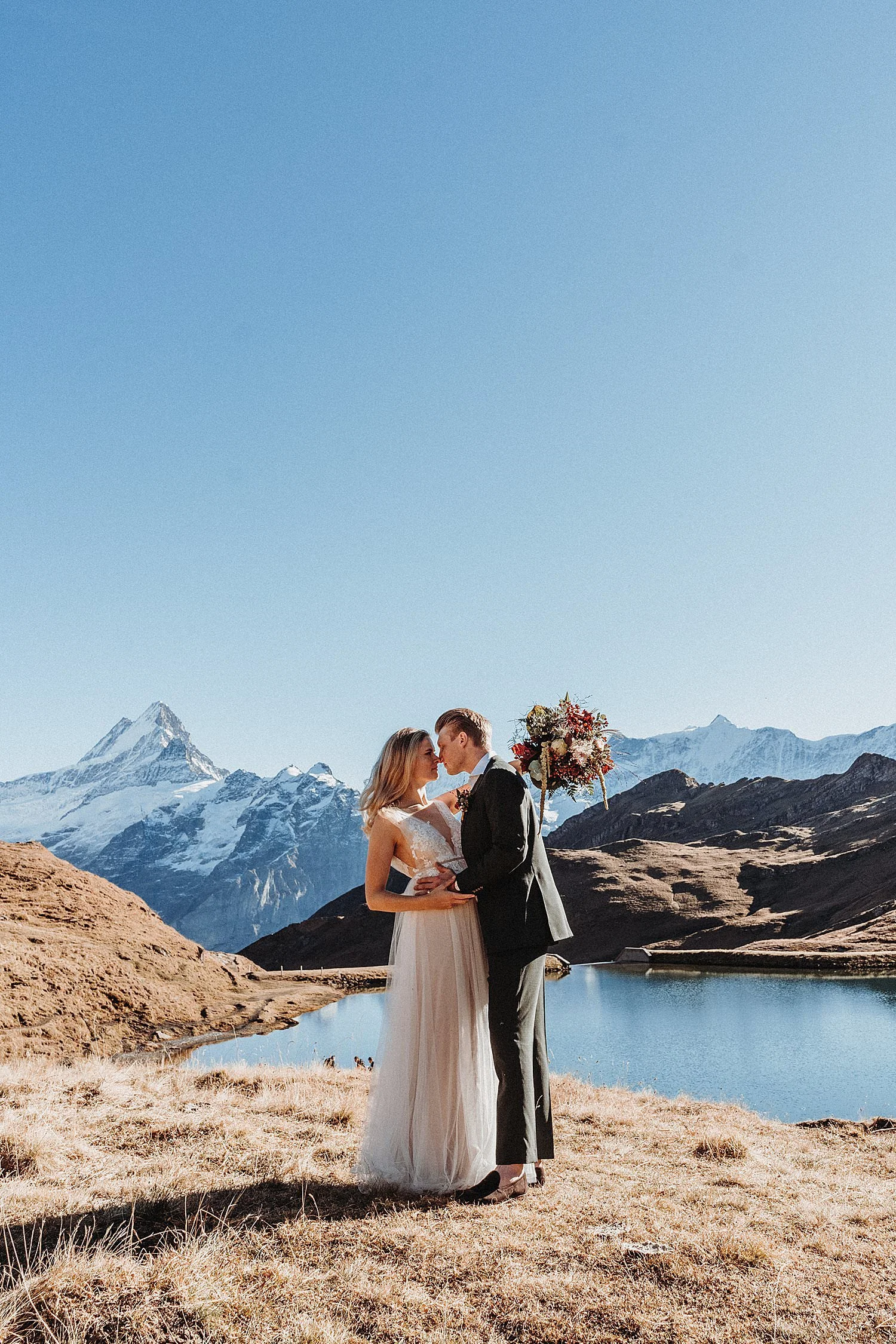 WayUpHigh-elopements-adventure-weddings-switzerland-mountain-wedding-autmn-classic-bride-groom-adventuring-alps-hiking-grindelwald-jungfrau-eiger  (38).jpg