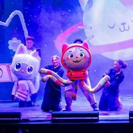 Stage performance from Gabby’s Dollhouse Live featuring colourful characters and performers dancing on stage in a vibrant children’s theatre show based on the popular animated series.