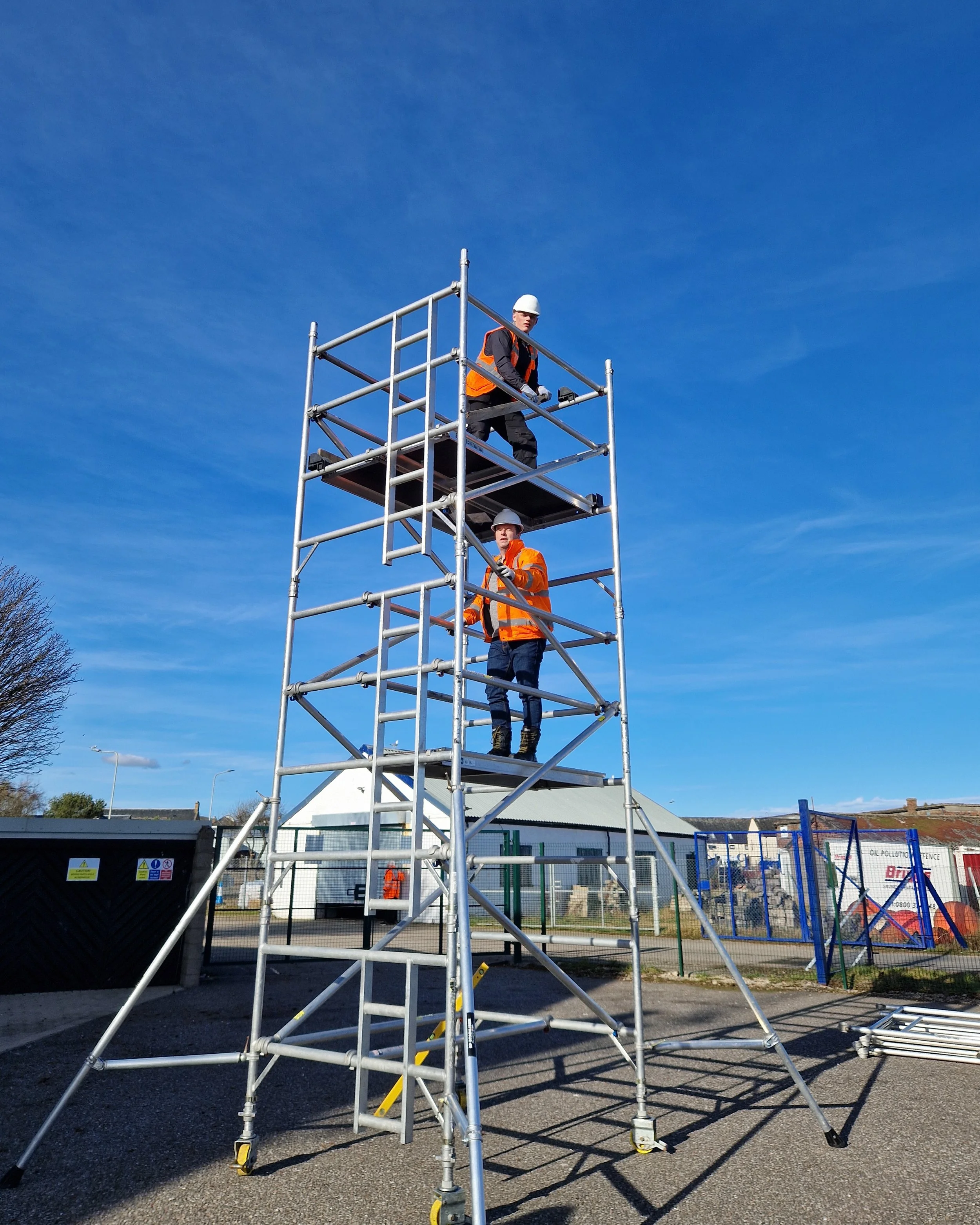 Two construction workers doing PASMA working at height training