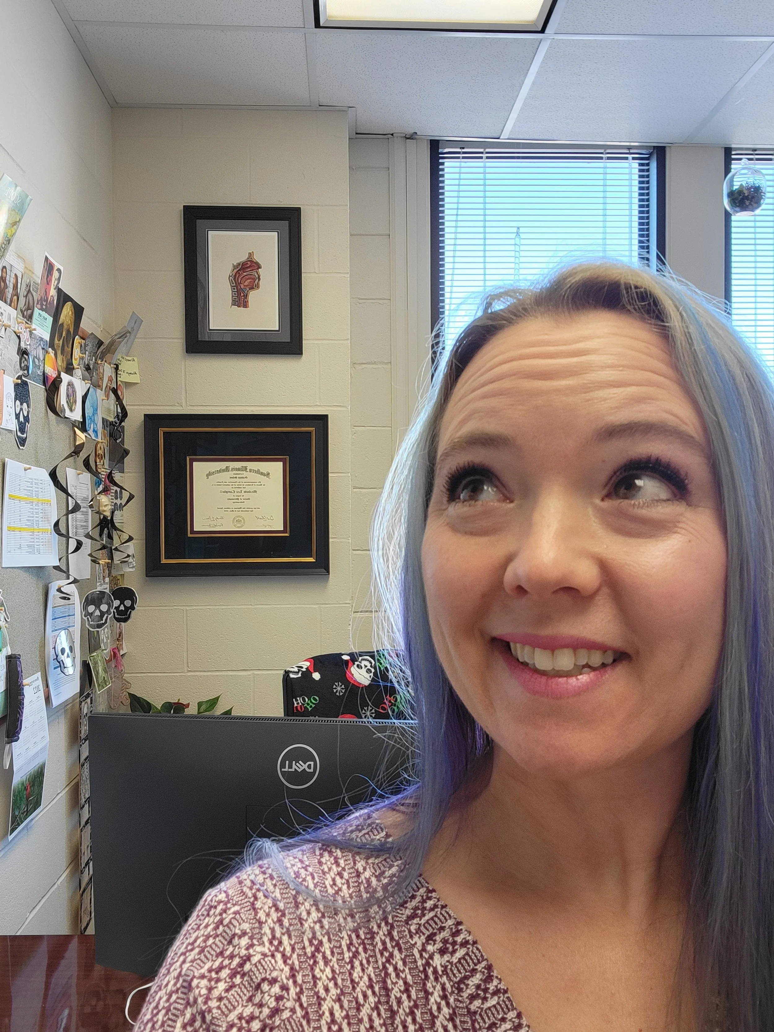 Excited about new office art at SLU