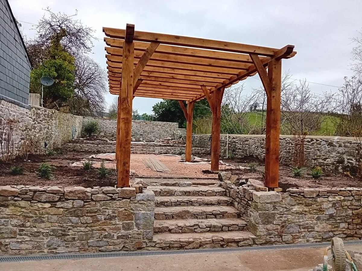 A momentous day for the Ashburton project!
From site survey in January through a late summer start on the hard landscaping, the re-levelling of the entire site into terraces and the construction of three retaining walls and underground drains&hellip;