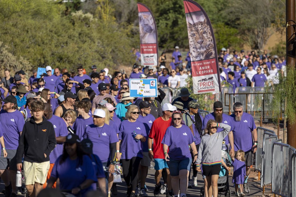 walkers with signs 21- zoo walk 2023 - photo credit - Dave Seibert PHX Zoo.JPG