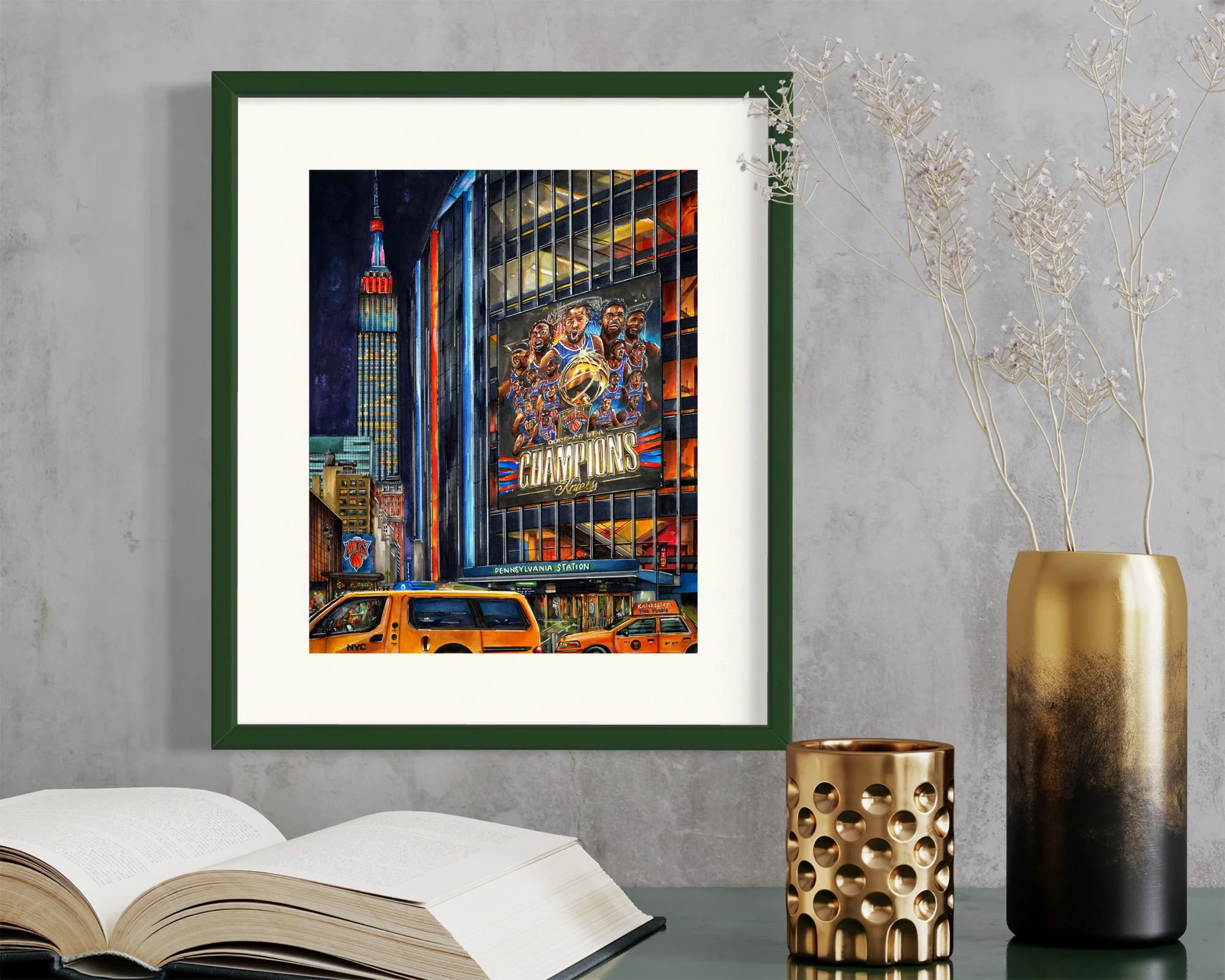 Framed in dark green, this hand-illustrated drawing of The New York Knicks, Champions of the 2026 NBA Finals print hangs on the wall