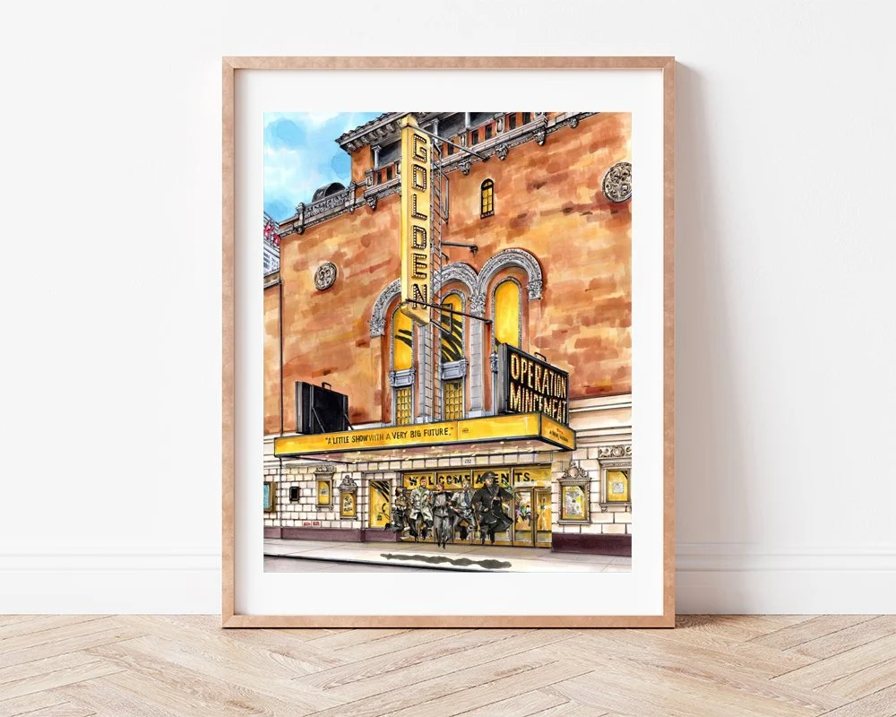 Leaning against a plain wall, Operation Mincemeat at the Historic John Golden Theatre drawing sits in a slim light wood frame