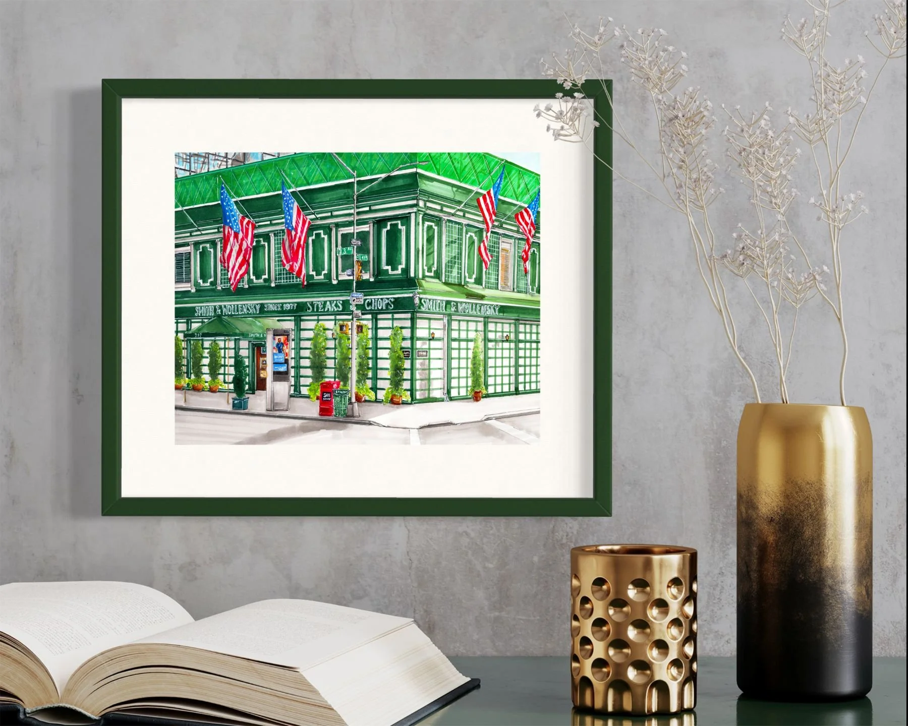 Framed in dark green, this hand-illustrated drawing of Smith & Wollensky print hangs on the wall
