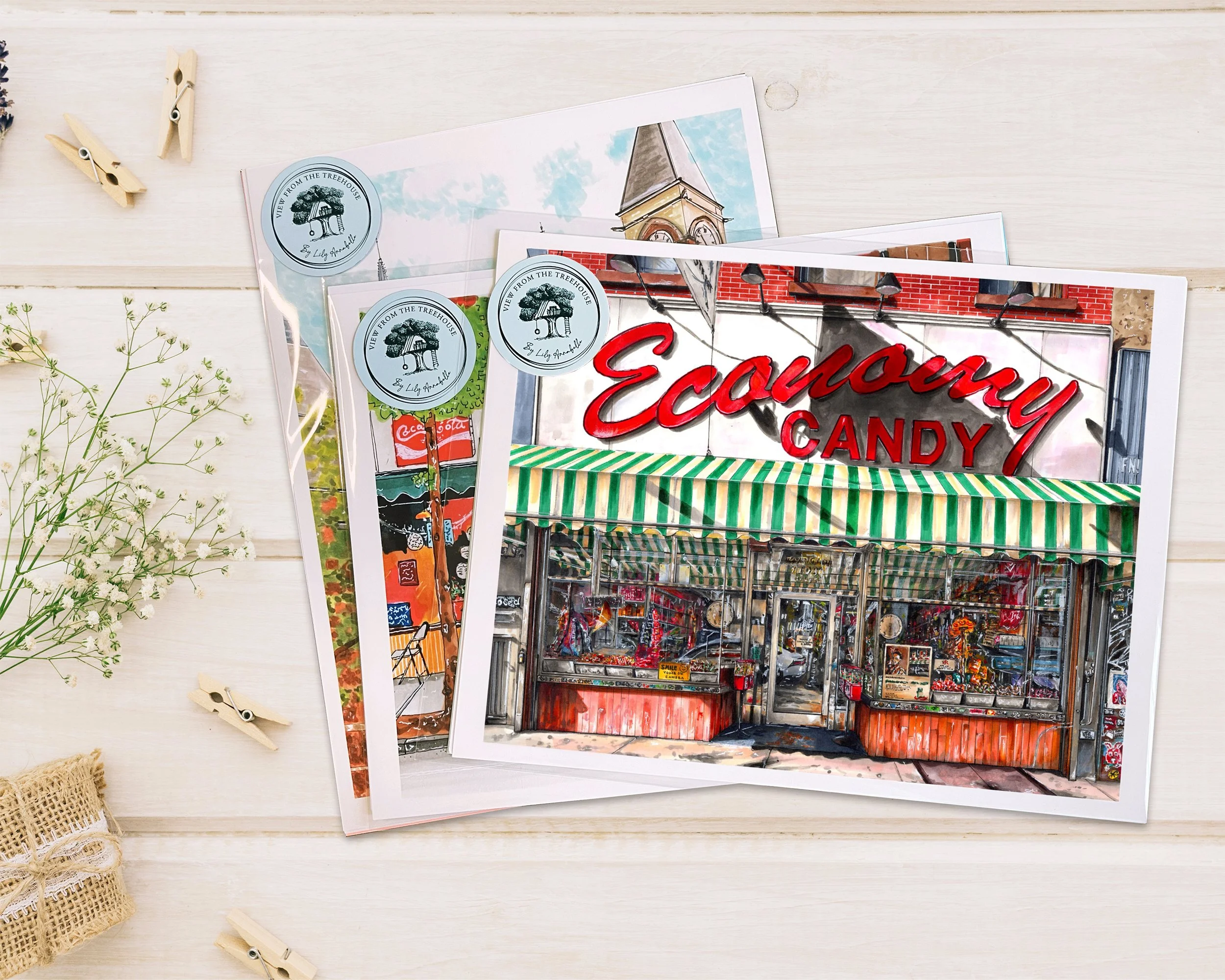 Hand-drawn Economy Candy NYC art print displayed on a wood table