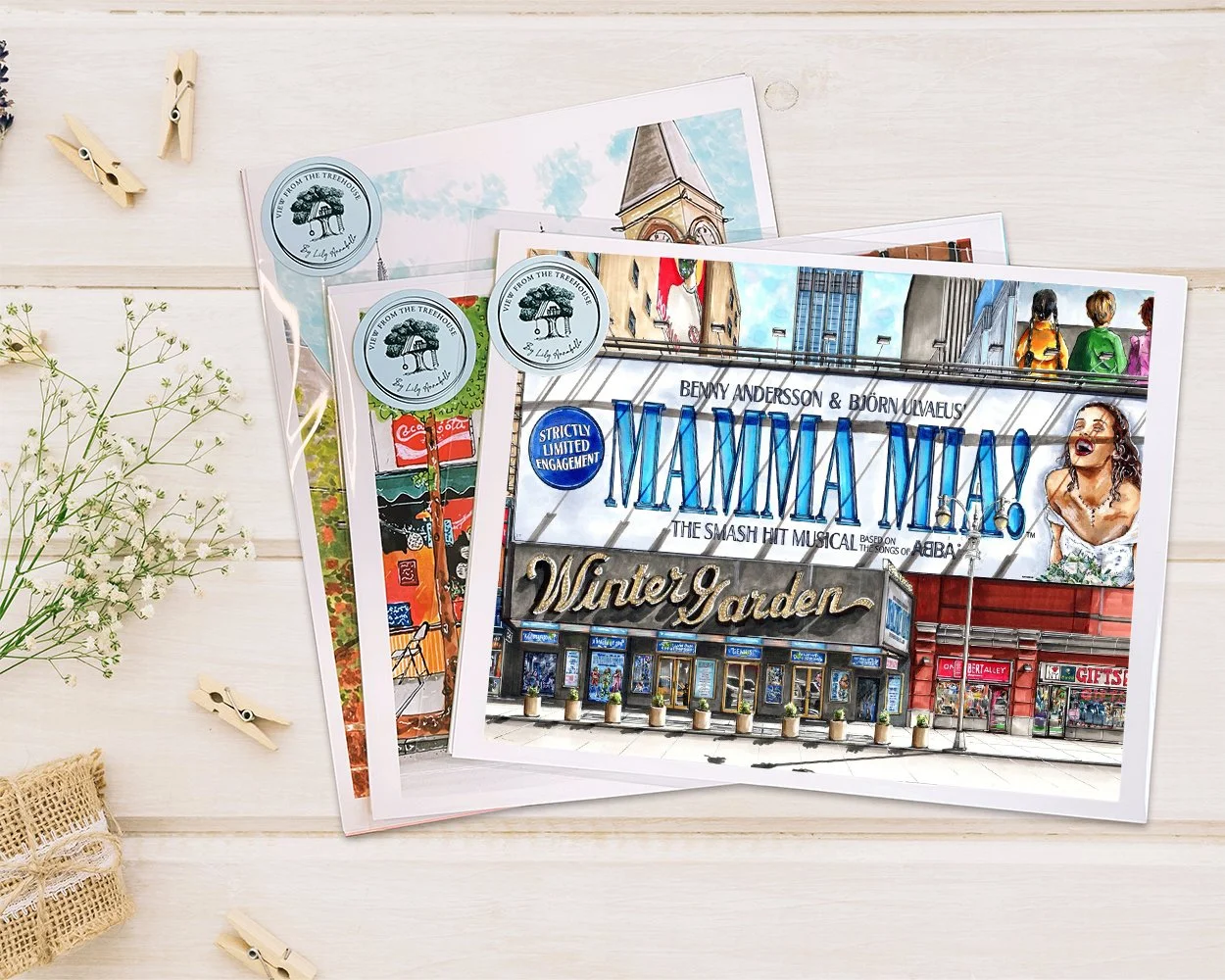Hand-drawn Mamma Mia ! the Broadway musical NYC art print displayed on a wood table