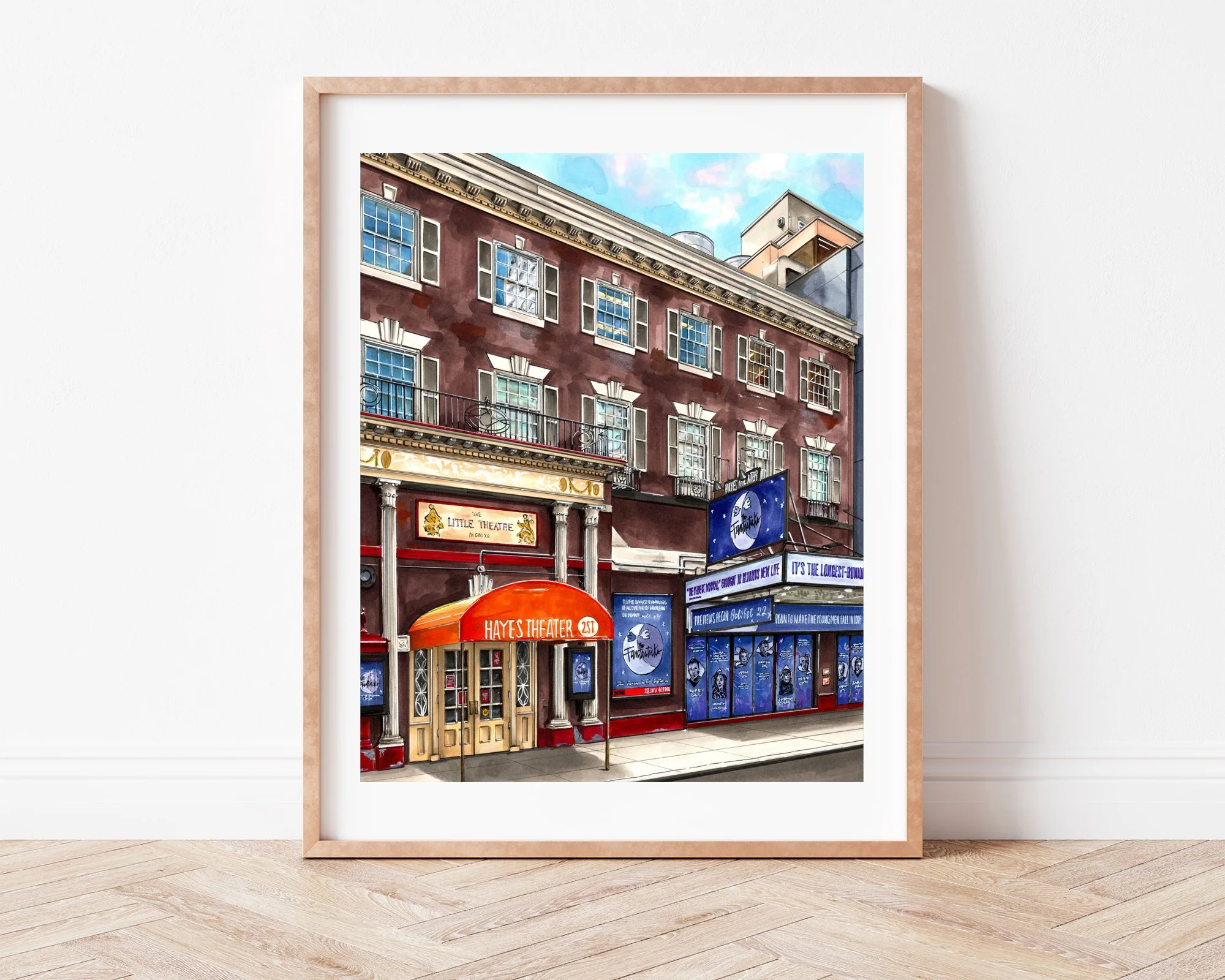 Leaning against a plain wall, The Fantasticks at Hayes Theatre drawing sits in a slim light wood frame