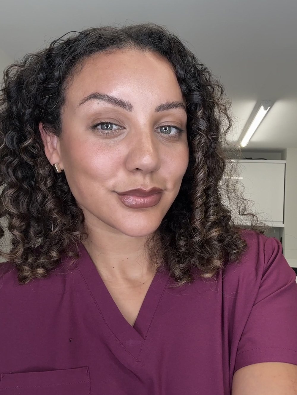 Founder of Stafford based aesthetics clinic smiling at camera