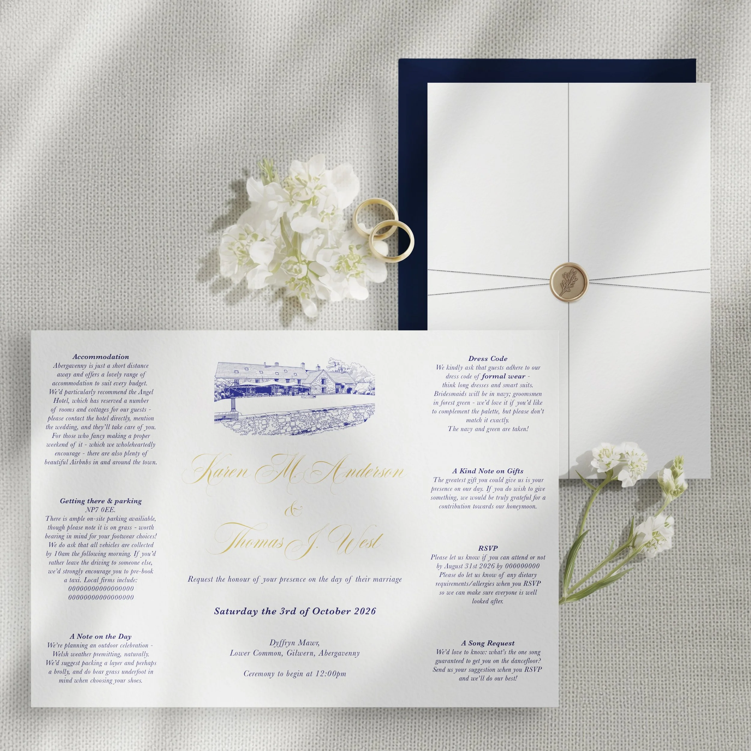 Wedding or formal event invitation printed on white paper with elegant script and illustration, accompanied by white flowers and a gold seal, placed on a textured gray surface.