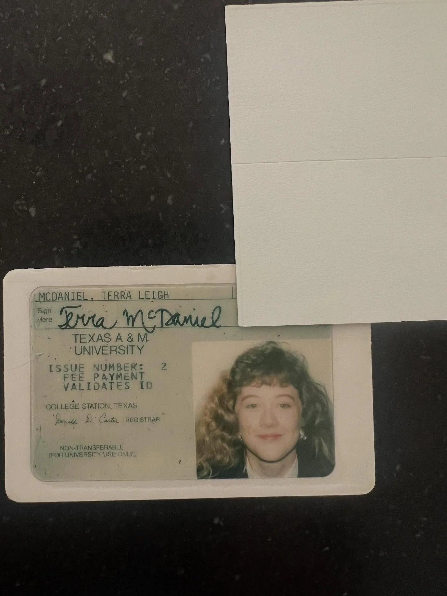 I was going through old letters and papers this weekend and came across this gem. Please notice my puffy early 90s bangs which I for sure had trimmed myself.

Please notice the enormous early 90s earrings that still had its toes in the 80s. 

And und