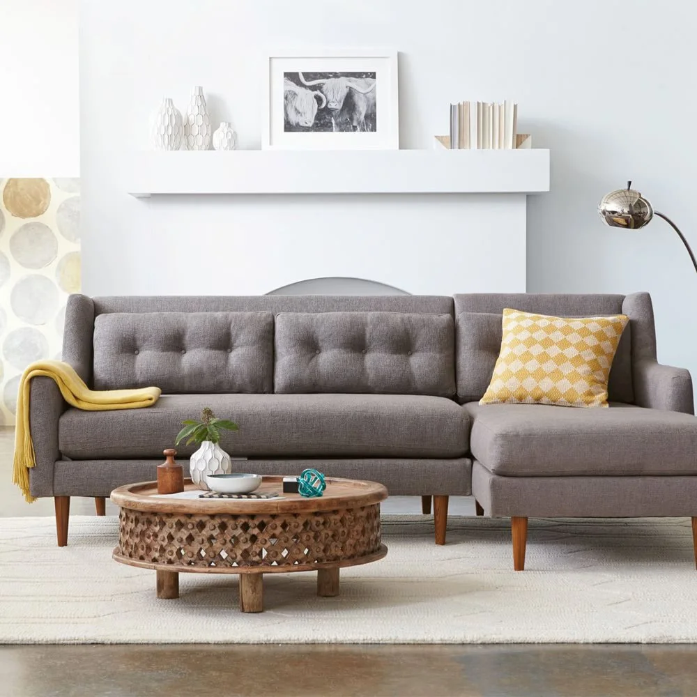 grey-2-piece-sectional-sofa-with-chaise-in-traditional-design-with-tufted-back-and-yellow-cushion-plus-steel-standing-lamp-and-wooden-coffee-table.jpg