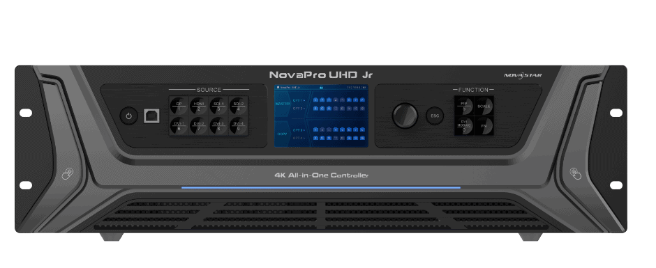 A NovaPro UHD Jr 4K All-in-One Controller, black with various buttons, knobs, and LED indicators for audio and video control, with a blue-lit display and a sleek design.