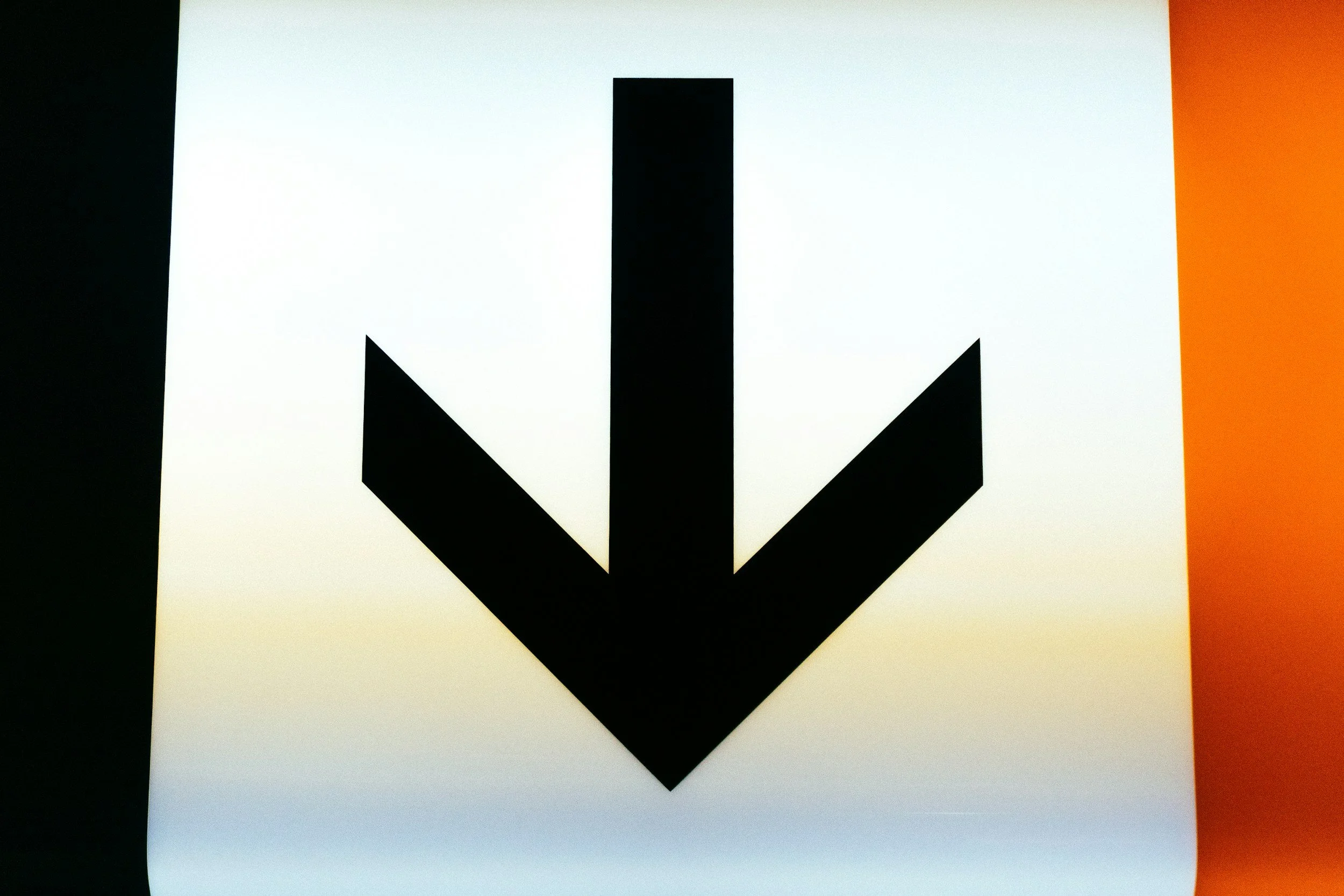 Arrow pointing down