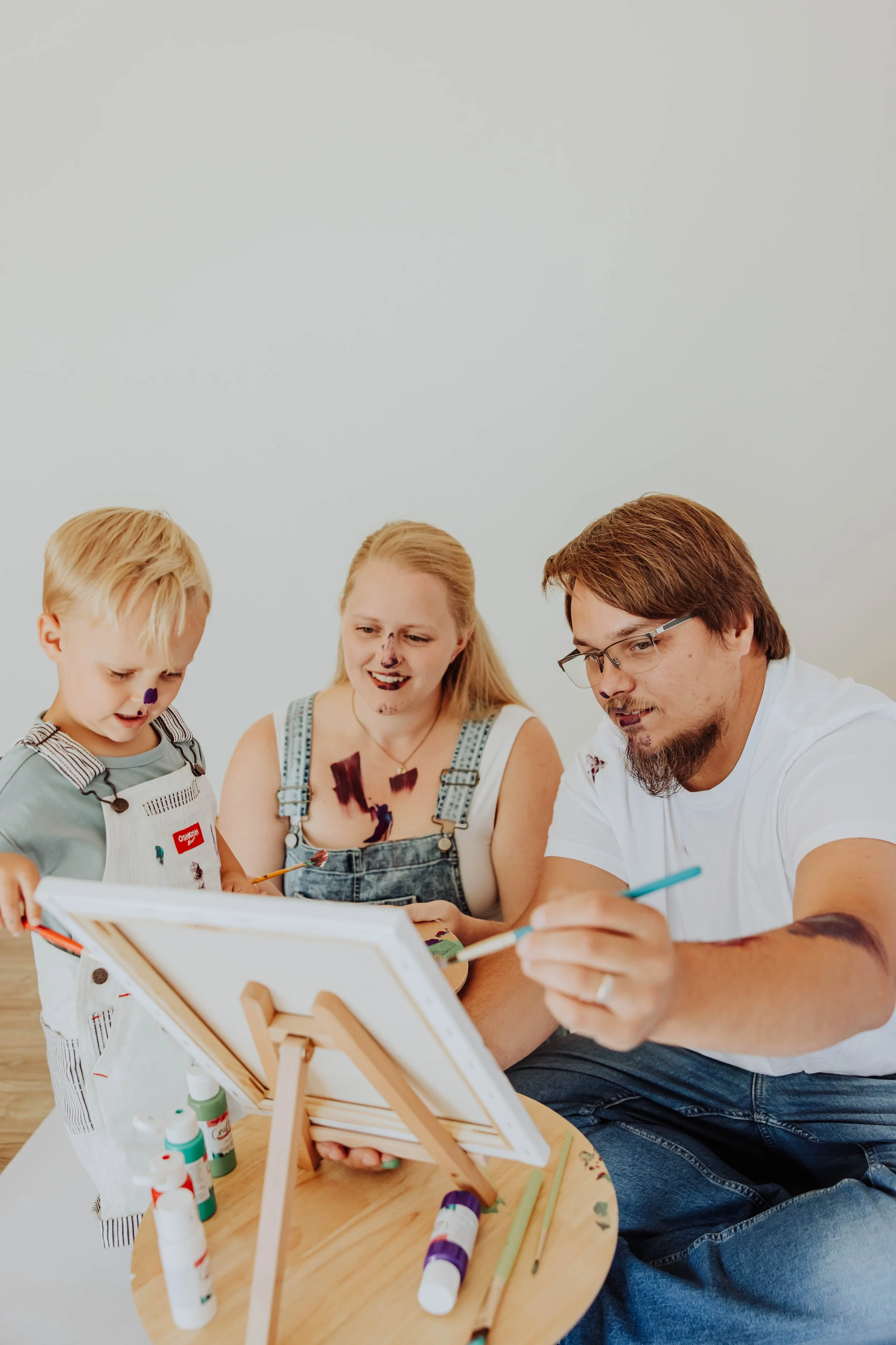 Family paint session at The ANS Collective Studio in Grandville with West Michigan family photographer Lexie Marie Photography.