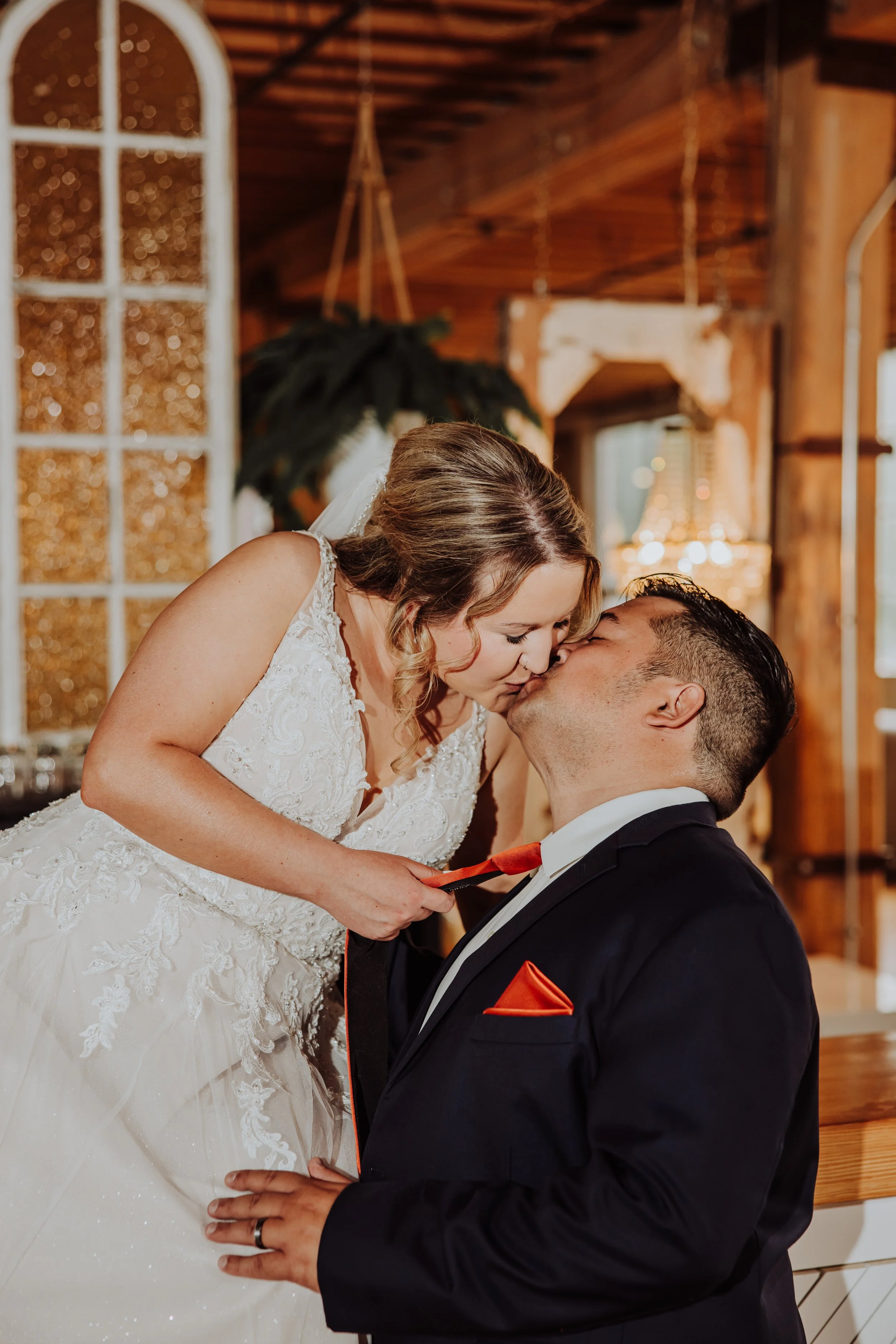 Bride and groom embracing inside The Cheney Place in Grand Rapids Michigan