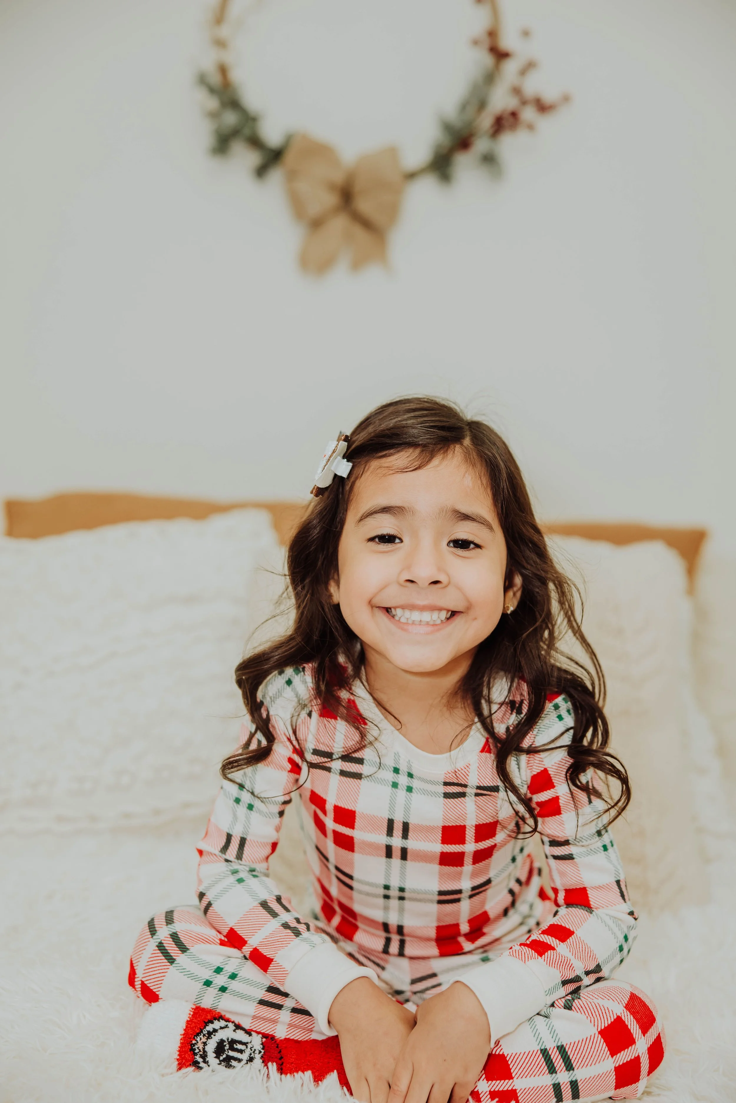 Christmas in-studio mini session: little girl in a plaid holiday dress