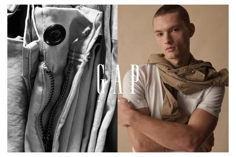 A split image with a close-up of gray clothing with a camera on the left, and a young man with crossed arms wearing a white t-shirt and a beige jacket draped over his shoulders on the right, featuring the GAP logo in the center.