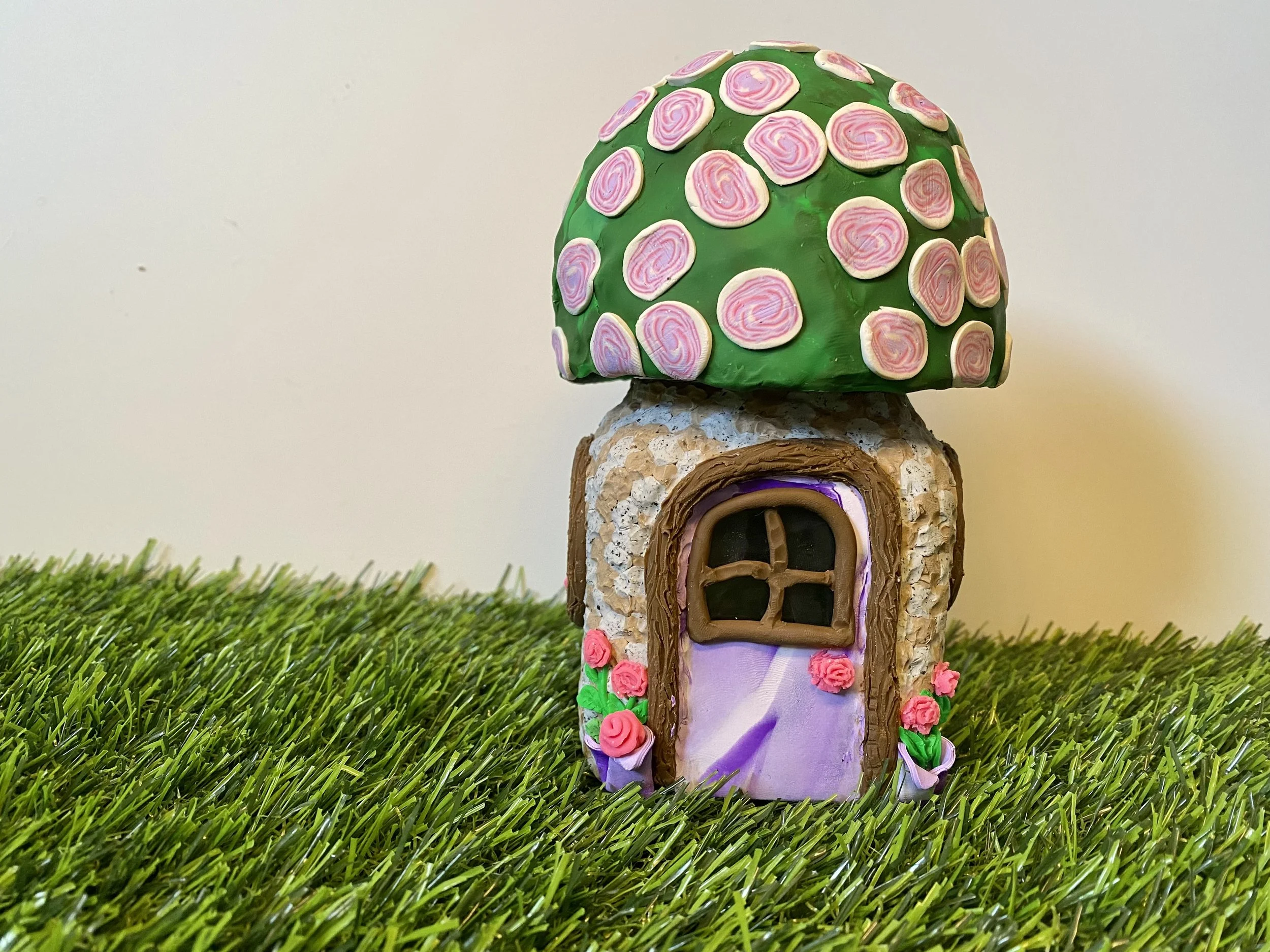 Stone Gnome House with Roses