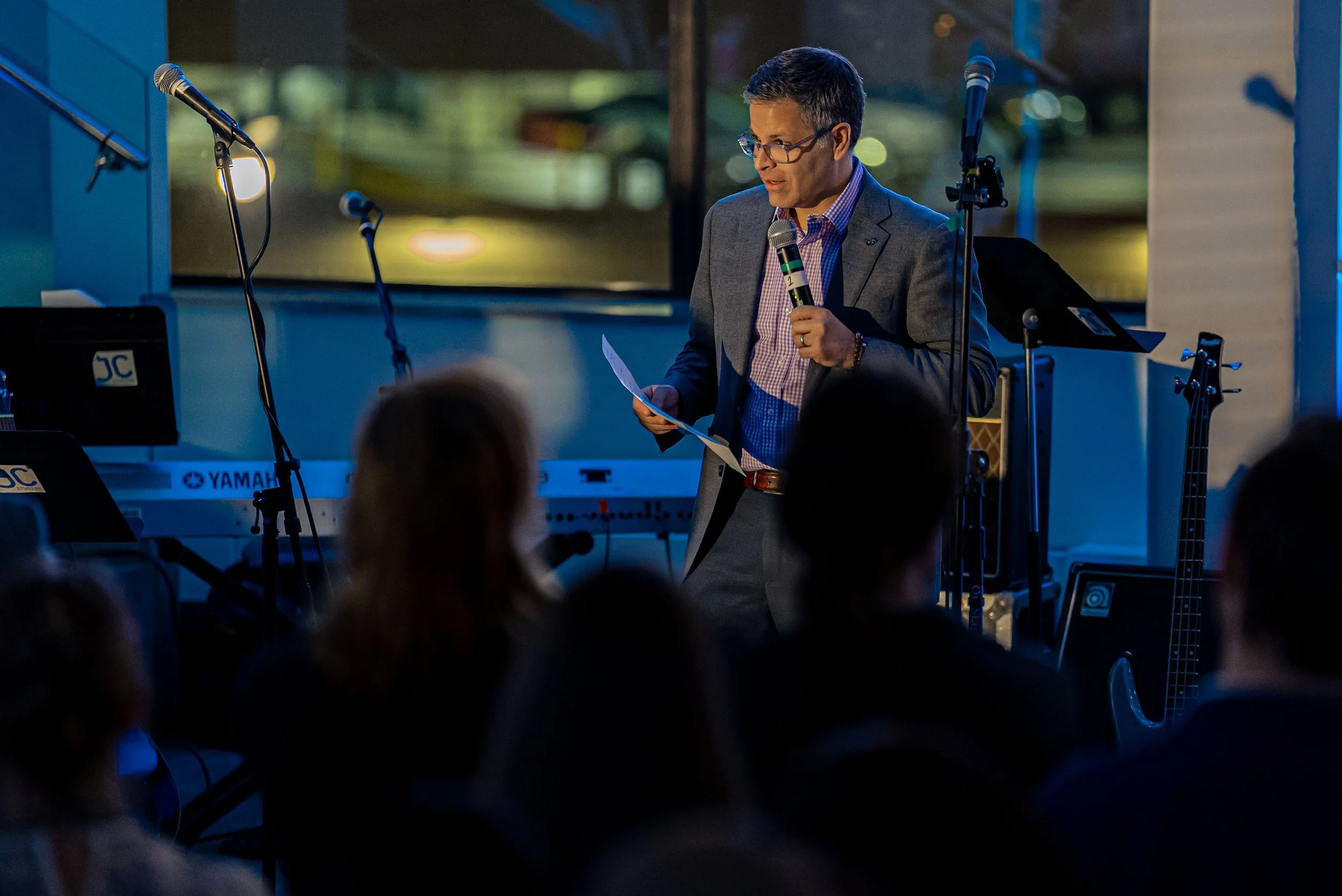 Speaker addressing guests during a nonprofit gala in New York City