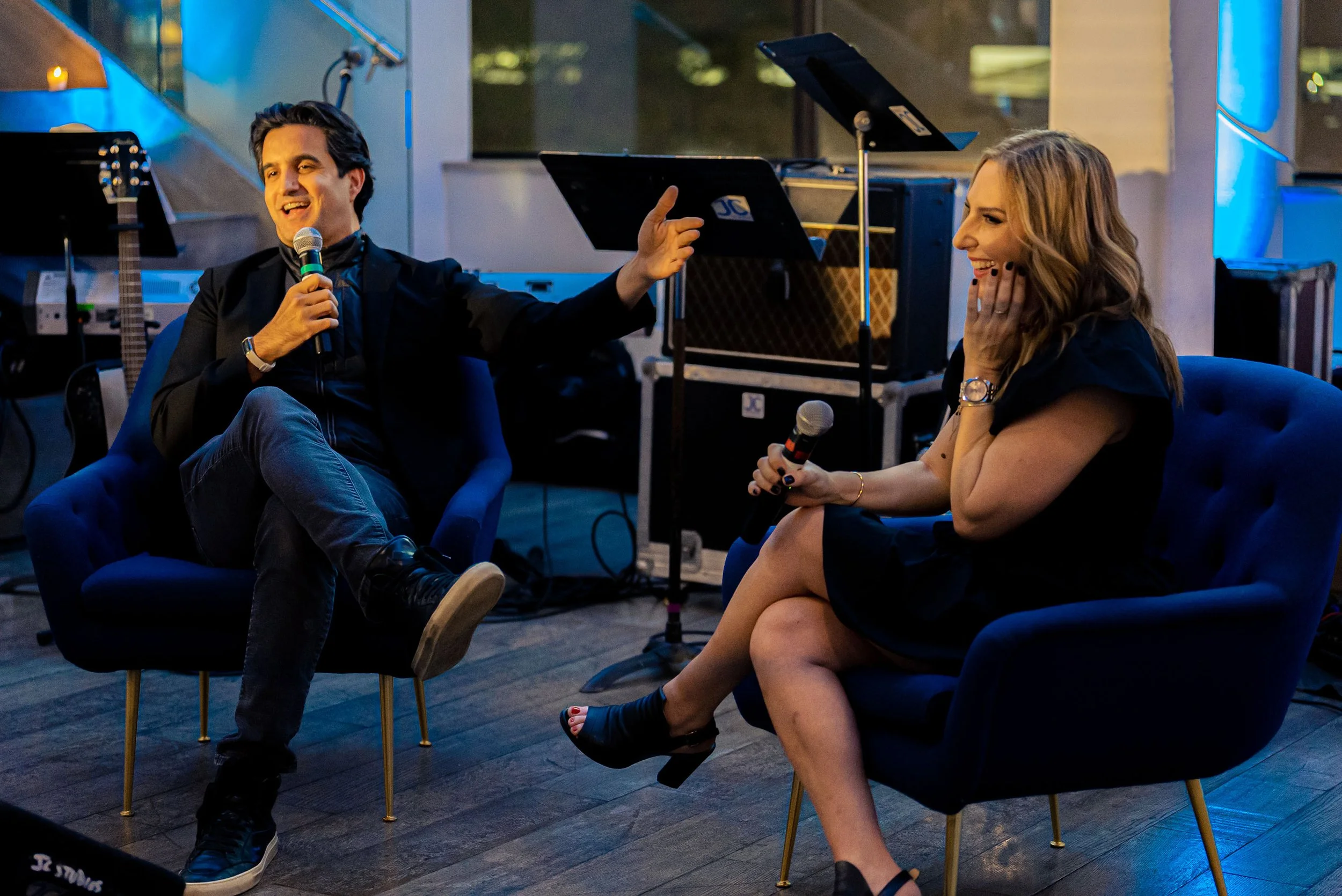 Two speakers in conversation during a nonprofit event panel in New York City