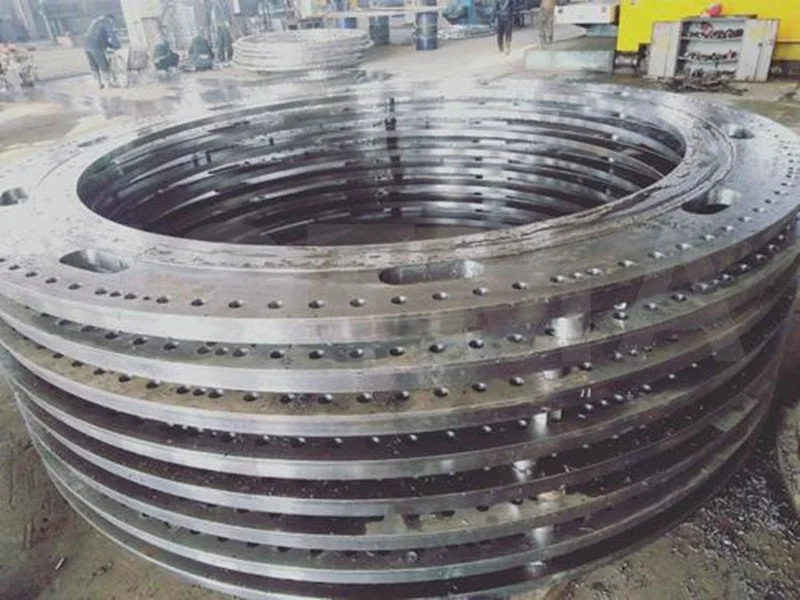 Steel sections, flanges, and structural components from wind turbine towers.