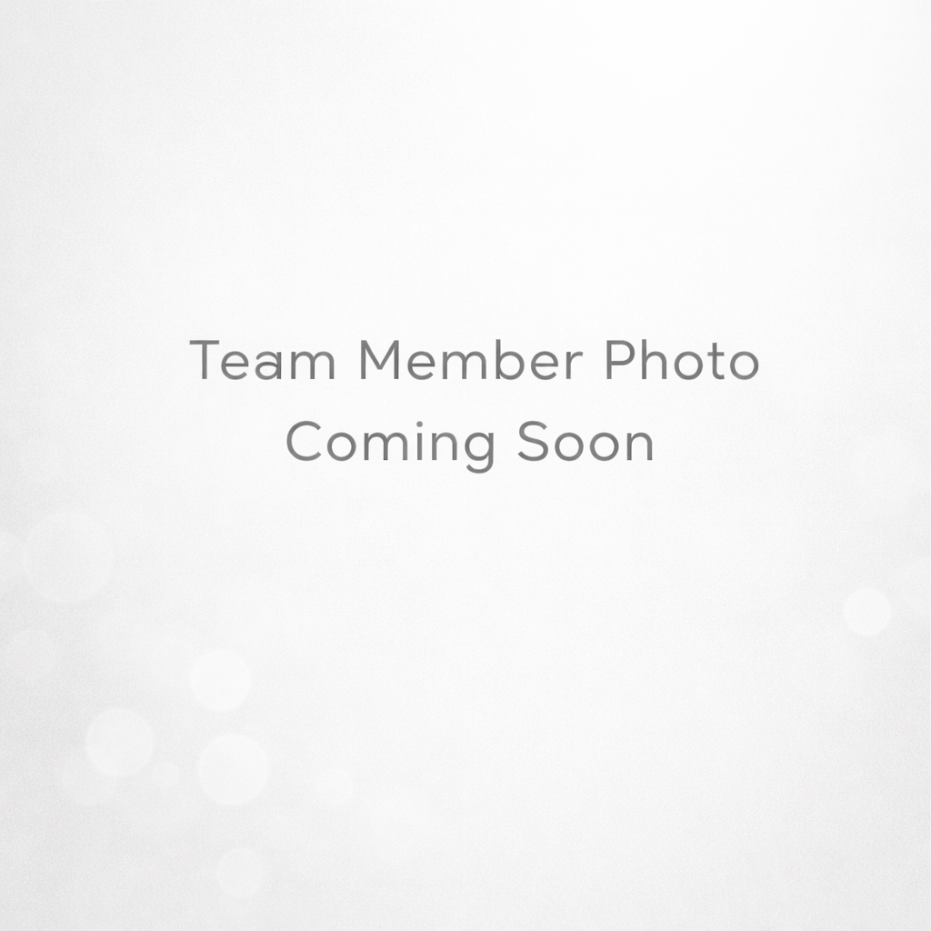 Placeholder image with text 'Team Member Photo Coming Soon' on a light background.