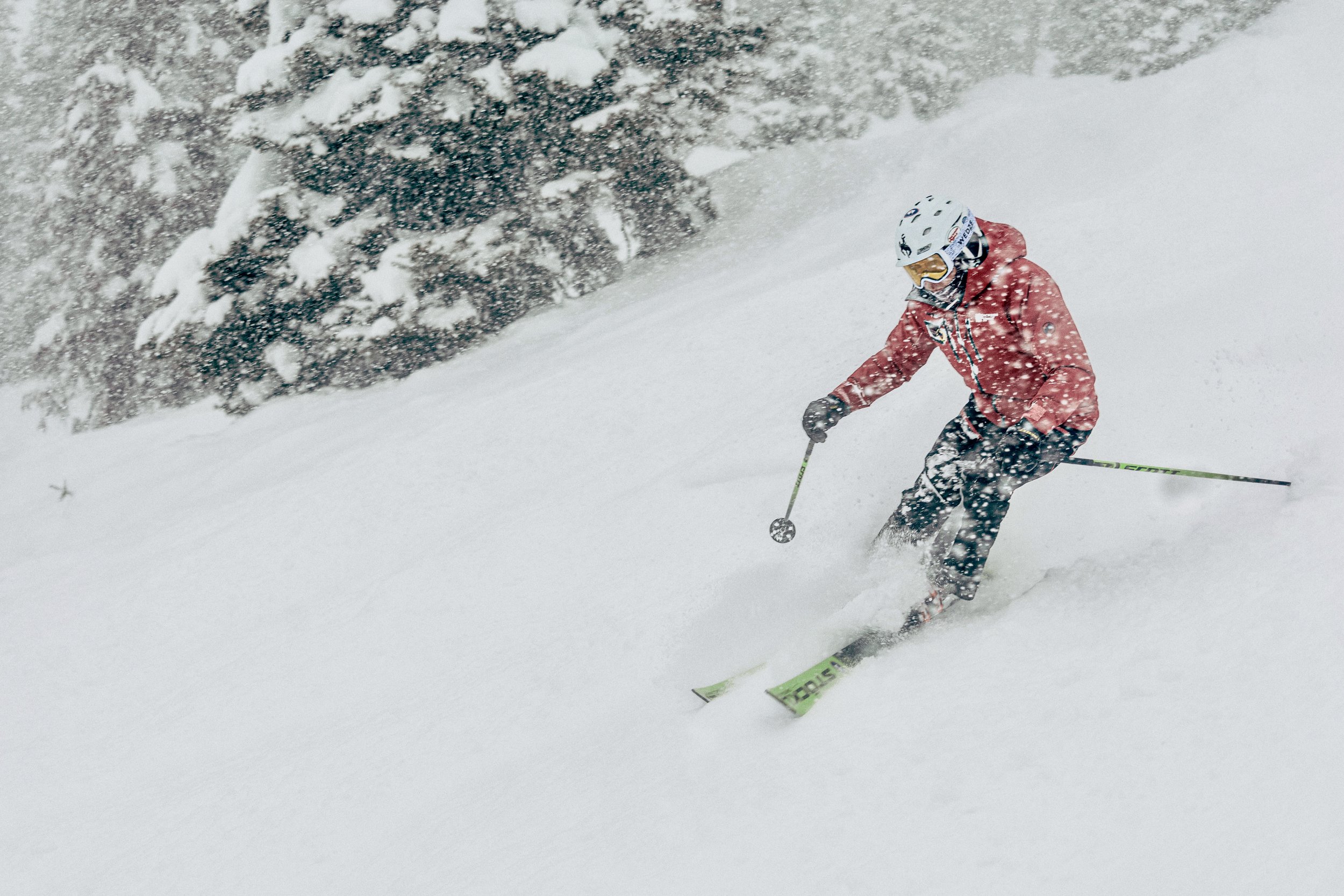 Skiing down the mountain in blizzard like conditions