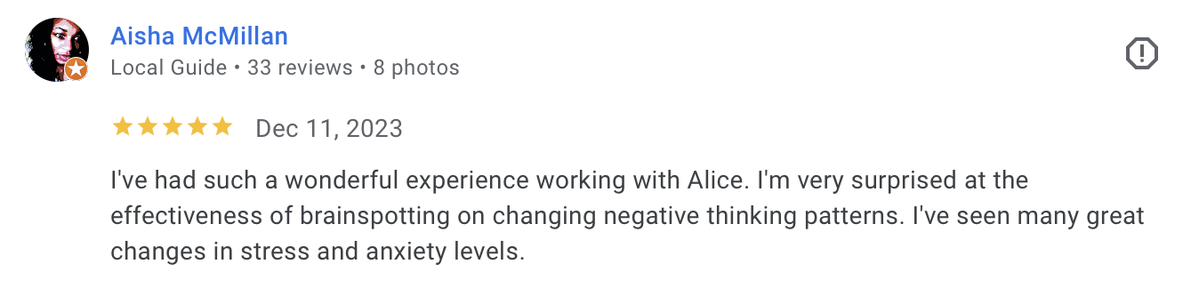 Screenshot of a Google review by Aisha McMillan, rated 5 stars, dated December 11, 2023, expressing positive experience working with Alice on changing negative thinking patterns to reduce stress and anxiety.